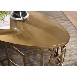 Table basse ovale pietement graphique aluminium dorÃ©